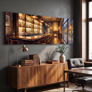 May include: A panoramic wall art print depicting a dimly lit bar interior with a long wooden counter, rows of illuminated liquor bottles on shelves, hanging pendant lights, and a fireplace, all viewed through a large window overlooking a rainy street.