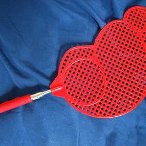 Telescopic ‘swift kick in the ass’ foot spanker