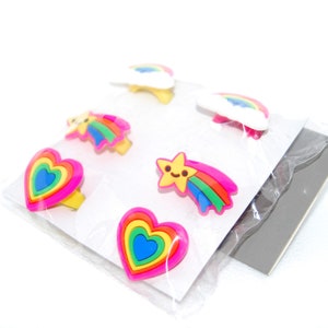 gay pride lgbtq+ rainbow colored shooting star concentric heart rubber rings / 6 count