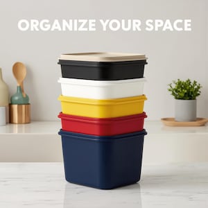 May include: A collection of rectangular storage containers in navy, red, yellow, white, and black, with a beige lid. The image includes the text "ORGANIZE YOUR SPACE" in white.