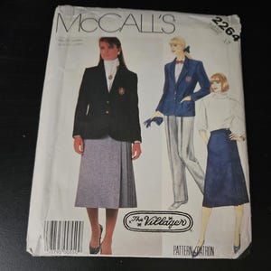 May include: A McCall's 2264 sewing pattern envelope featuring illustrations of a blazer, a skirt, and trousers. The cover displays the text "McCall's", "2264", and "The Villager". The illustrations show a black blazer, a grey skirt, a blue blazer, and grey trousers.