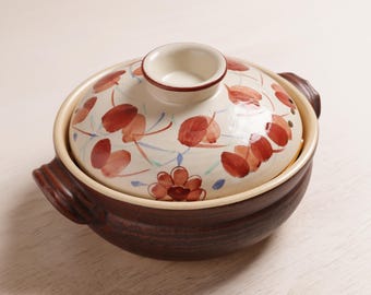 Handgemaakte bloemenkeramische donabepot, vintage kleibraadpan met deksel, traditioneel Japans kookcadeau
