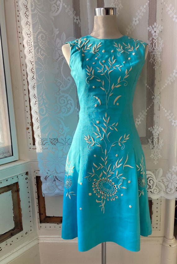 60s Mad Men-style turquoise pale blue sun dress wi