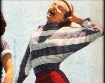 May include: A woman wearing a striped sweater and red pants poses on a dock. The text "Tick Tock Knits" is visible in the image.