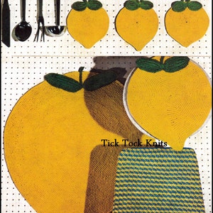 May include: A set of crocheted lemon-shaped hot pads in yellow and green. The hot pads are arranged on a pegboard with a set of kitchen utensils hanging above them. The text "Tick Tock Knits" is visible in the image.
