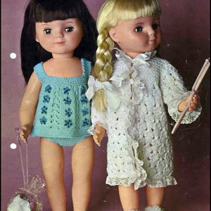 May include: A knitting pattern for two dolls, one in a blue dress and one in a white robe. The pattern is for sizes 14, 16, and 18 inch dolls. The pattern is from Patons and is number 9920.