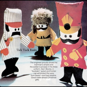 May include: Three knitted plush toys: a train conductor, a frontiersman, and a soldier. The toys are all wearing their respective uniforms and have friendly faces. The text "Tick Tock Knits" is visible at the bottom of the image.