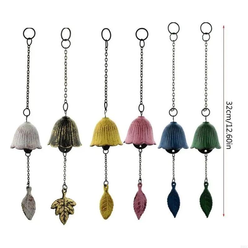 May include: Set of six decorative wind chimes. Each chime features a bell-shaped top in various colors, including white, gold, yellow, pink, blue, and green. The chimes are suspended by chains and adorned with leaf-shaped pendants. The total length is 12.60 inches.