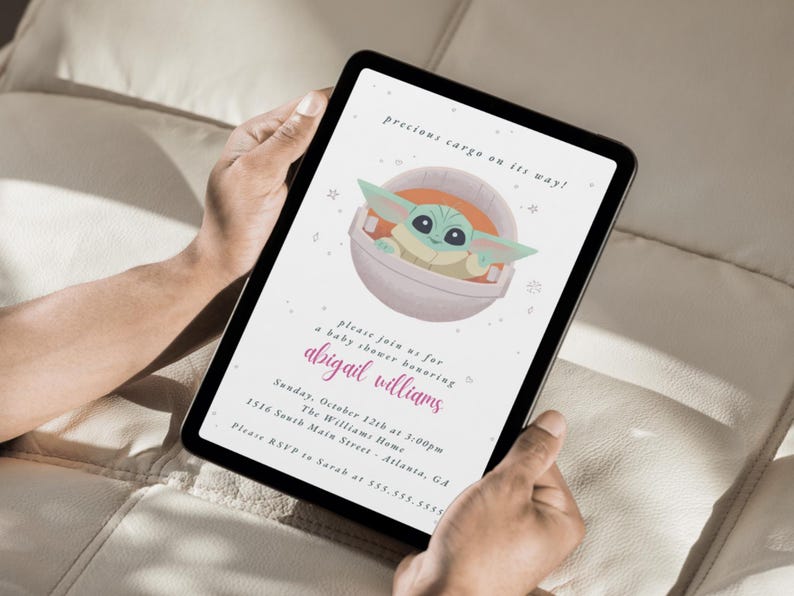 May include: Digital baby shower invitation featuring a cartoon character in a pod. The invitation includes the text "precious cargo on its way!" and details for a baby shower honoring Abigail Williams, including the date, time, and location.