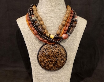 Bib necklace by Nature bijoux in wood and stones