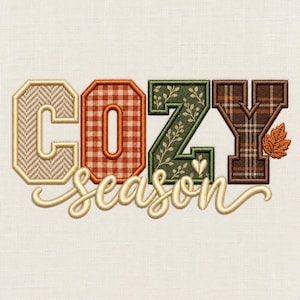 May include: An embroidery design featuring the word COZY in block letters with varied patterns: herringbone, orange gingham, green floral, and brown plaid. The word season is written below in cursive script with a small orange leaf.