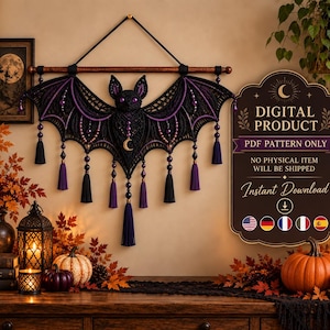 May include: A macrame wall hanging shaped like a bat with black and purple cord, featuring a gold crescent moon charm, beads, and tassels. A sign reads: DIGITAL PRODUCT, PDF PATTERN ONLY, NO PHYSICAL ITEM WILL BE SHIPPED, Instant Download.