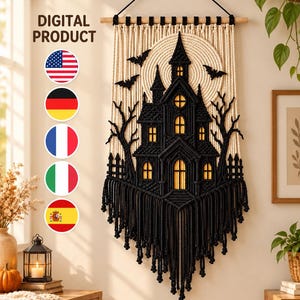 May include: A macrame wall hanging featuring a black haunted house silhouette against a large cream-colored circular moon. The design includes black bats, bare trees, and a fence, with yellow light accents in the windows. Text reads DIGITAL PRODUCT.