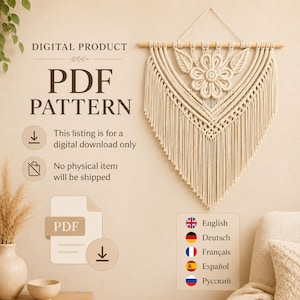May include: A digital product PDF pattern featuring a macrame wall hanging with a central flower design and leaf accents suspended from a wooden dowel. The text reads DIGITAL PRODUCT PDF PATTERN, This listing is for a digital download only, and No physical item will be shipped.