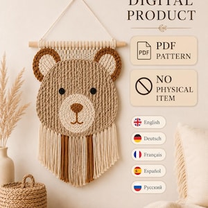 May include: A macrame wall hanging featuring a bear face design in shades of tan, brown, and cream, suspended from a wooden dowel. Text on the right reads DIGITAL PRODUCT, PDF PATTERN, and NO PHYSICAL ITEM, with a list of available languages.