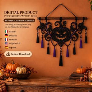 May include: A digital PDF crochet pattern for a wall hanging featuring a black jack-o'-lantern design with purple accents, hanging from a wooden rod with black and purple tassels and beads. The text reads DIGITAL PRODUCT PDF CROCHET PATTERN ONLY.