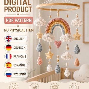 May include: A digital PDF pattern for a crochet mobile featuring a central rainbow, white clouds, yellow stars, a pink heart, and blue and pink raindrops suspended from a circular wooden frame. Text includes DIGITAL PRODUCT, PDF PATTERN, and NO PHYSICAL ITEM.