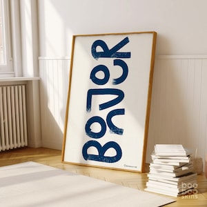 May include: A framed print featuring the word "COLOR" in large, bold, blue lettering on a white background.