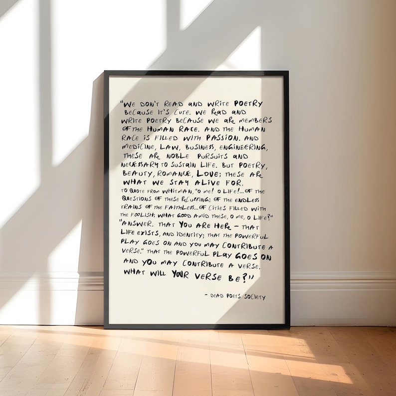 May include: A framed wall art print featuring a quote from the film Dead Poets Society written in black handwritten-style text on a cream background. The text includes the famous monologue about poetry, life, and the question, What will your verse be?