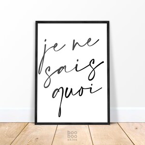 May include: Black and white printable wall art with the French phrase "Je ne sais quoi" written in cursive script.