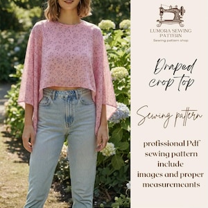 May include: A pink floral print crop top with wide sleeves and a round neckline, paired with light blue denim jeans. The text reads Lumora Sewing Pattern, Draped crop top, Sewing pattern, professional Pdf sewing pattern include images and proper measuremeants.
