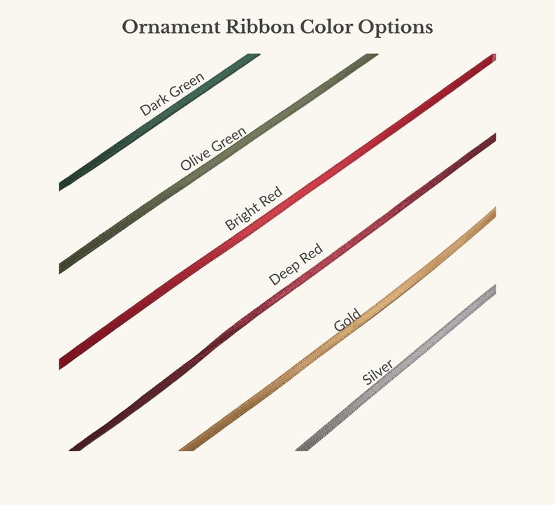 May include: A color chart titled Ornament Ribbon Color Options displaying six diagonal ribbon samples in dark green, olive green, bright red, deep red, gold, and silver. Each ribbon is labeled with its corresponding color name in black text.