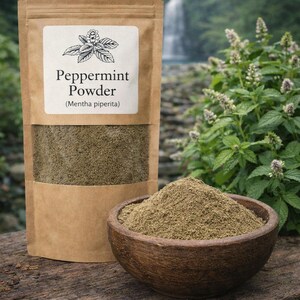 May include: A brown paper pouch labeled Peppermint Powder (Mentha piperita) with a clear window showing green powder, accompanied by a wooden bowl filled with the same fine green peppermint powder, showcasing a botanical illustration on the label.