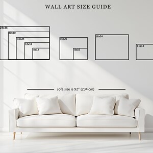 May include: A wall art size guide featuring black rectangular outlines representing various dimensions in inches, including 24x36, 20x30, 16x24, 12x18, 8x12, 16x20, 8x10, 18x24, and 11x14. Below, a white sofa is shown with a label indicating a sofa size of 92 inches.