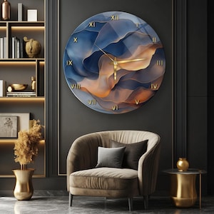 May include: A large circular wall clock featuring a fluid, abstract design in shades of deep blue, amber, and gold. The clock face displays gold Roman numerals and thin gold hands, creating a striking contrast against the swirling, layered color patterns.