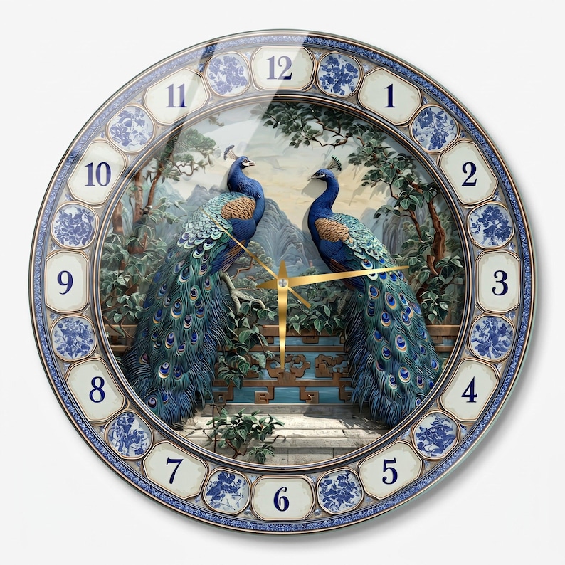 May include: A round wall clock featuring two peacocks with blue and green plumage perched on a stone railing. The clock face has a border with blue and white floral patterns and dark blue numerals from 1 to 12, with gold-colored clock hands.