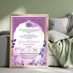 May include: A framed wedding invitation with a purple and gold design. The invitation includes floral accents, calligraphy, and the names "Samira with Muhammad." The date is July 11, 2026. The invitation also includes the venue and RSVP information.
