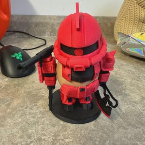 Figura Gundam Capybara: connessione magnetica Zaku