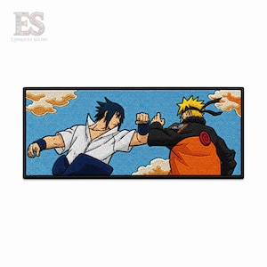 May include: A rectangular embroidered patch featuring a blue sky background with orange clouds. Two anime characters are depicted in a dynamic fist bump pose. One character has dark hair and a white shirt, while the other has blonde hair and an orange jacket.