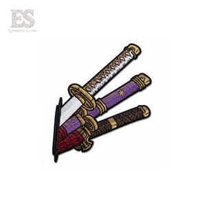 May include: An embroidered patch featuring three katana swords arranged in a cluster. The swords have gold-colored hilts and guards, with one white, one purple, and one red scabbard. The design includes intricate stitching and black borders.