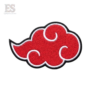 May include: An embroidered patch in the shape of a stylised cloud. The design features a vibrant red centre with a thick white outline and a bold black border. The texture shows dense thread work throughout the entire cloud-shaped emblem.