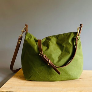 ARRAN waxed canvas large bucket bag in Forest Green with adjustable tan leather straps by HOLMgoods