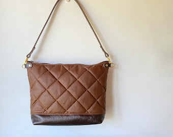 Quilted puffy grid waxed canvas crossbody padded bag - adjustable leather strap - tan wax fabric brown leather base lightweight handbag