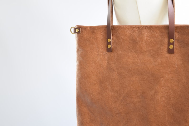 Large Leather tote bag lined with secure zip pocket and convertable cross body strap , Saddle Tan colour leather purse by Holm goods image 3