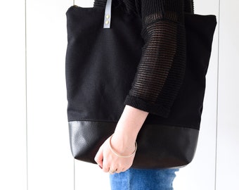 Large black tote bag, great market bag,  waterproof canvas, full zipper, strong leather shoulder straps, perfect for work, school, shopping