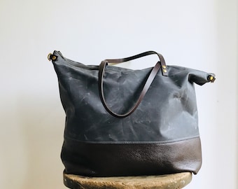 Waxed canvas large tote bag. Stylish minimal work, gym, weekend bag. Spacious holdall large enough for laptop. Grey wax canvas with pockets.