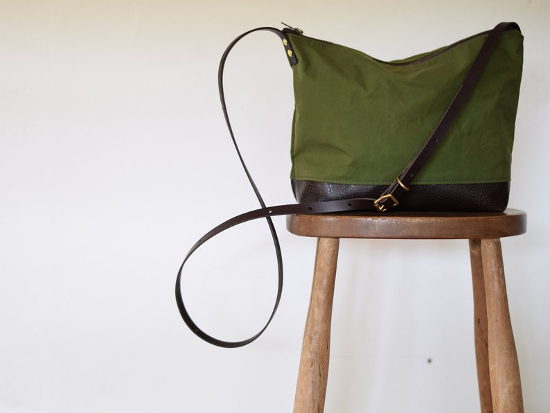 waxed canvas crossbody bag minimal design adjustable leather strap leather base image 9