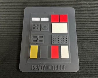 COMPAD DE PILOTAGE À ATTACHES FLEXIBLES