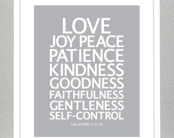 May include: A gray framed print with a white background and white text. The text reads "LOVE JOY PEACE PATIENCE KINDNESS GOODNESS FAITHFULNESS GENTLENESS SELF-CONTROL GALATIANS 5:22-23".