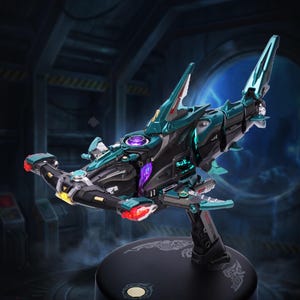 May include: A futuristic, detailed model of a hammerhead shark-shaped spacecraft. The model features a black and teal color scheme with red, purple, and yellow accents. It is mounted on a black display stand with intricate designs.
