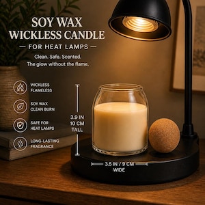 May include: A soy wax wickless candle in a clear glass jar, positioned under a black heat lamp. The candle is 10 cm tall and 9 cm wide. Text on the image reads: SOY WAX WICKLESS CANDLE FOR HEAT LAMPS. Clean. Safe. Scented. The glow without the flame.