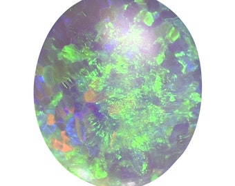 May include: A green, blue and purple opal gemstone with a white background.