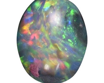 May include: A black opal gemstone with a green, blue, and red iridescent sheen. The opal is oval shaped and has a smooth, polished surface.