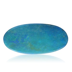 May include: A smooth, oval-shaped blue opal gemstone with a light blue and green color pattern. The gemstone is set against a white background and has a reflection below it.