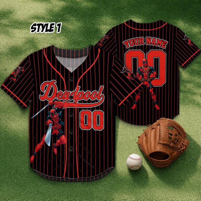 May include: Black baseball jersey with red pinstripes, featuring the word "Deadpool" and the number "00" in red. The jersey has a Deadpool graphic and the text "YOUR NAME" on the back. A baseball glove and ball are also in the image.