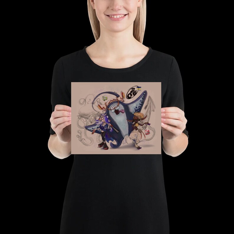 May include: A rectangular art print featuring a central illustration of a large blue manta ray character with a wide mouth, flanked by two smaller stylised figures. The background is a light tan colour with faint, swirling line art sketches.